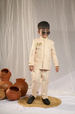 BEIGE SHERWANI WITH MATCHING PANTS